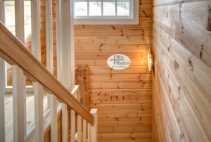 Wooden staircase in a modern log house
